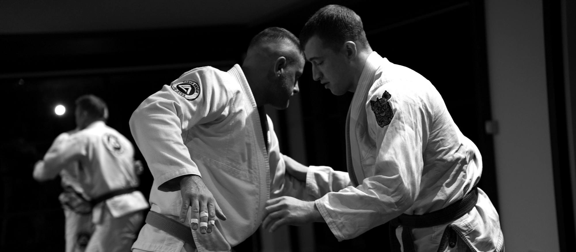 Black belts drilling technique at the academy